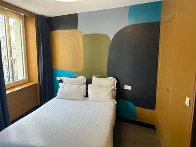 Un ou plusieurs lits dans un hébergement de l'établissement Appartement Censier Daubenton