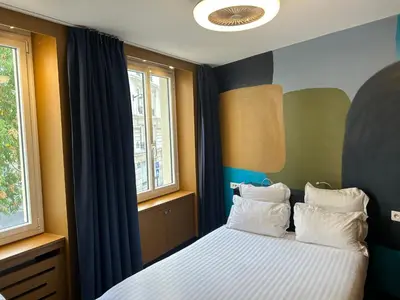 Un ou plusieurs lits dans un hébergement de l'établissement Appartement Censier Daubenton