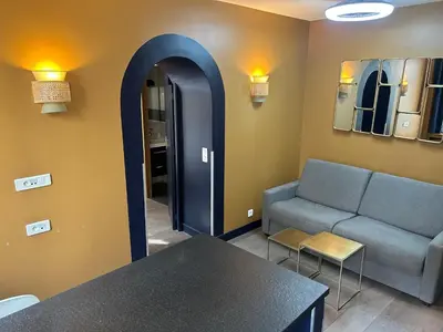 Coin salon dans l'établissement Appartement Censier Daubenton
