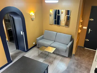 Coin salon dans l'établissement Appartement Censier Daubenton
