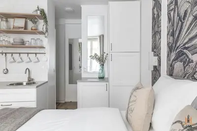 Un ou plusieurs lits dans un hébergement de l'établissement Montmartre Apartments Chagall