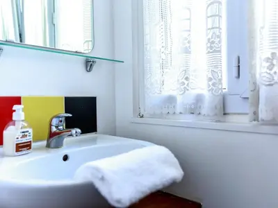 Un ou plusieurs lits dans un hébergement de l'établissement Montmartre Apartments Monet
