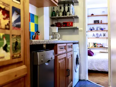 Cuisine ou kitchenette dans l'établissement Montmartre Apartments Monet