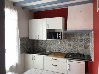 Cuisine ou kitchenette dans l'établissement Villa Liberté