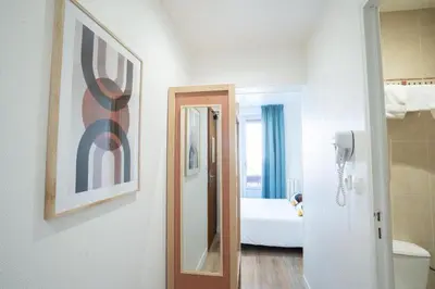 Salle de bains dans l'établissement Hôtel Edgar Quinet