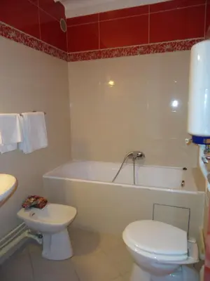 Salle de bains dans l'établissement Hotel des Belges