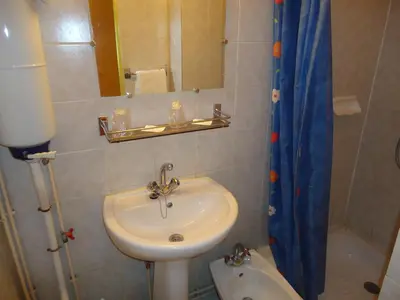 Salle de bains dans l'établissement Hotel des Belges