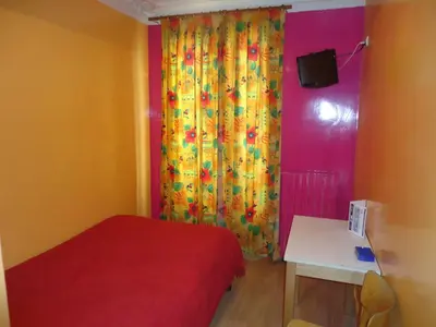 Un ou plusieurs lits dans un hébergement de l'établissement Hotel des Belges