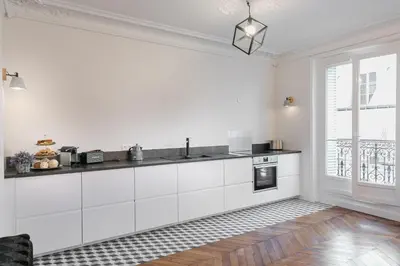 Cuisine ou kitchenette dans l'établissement La Résidence du Sénateur