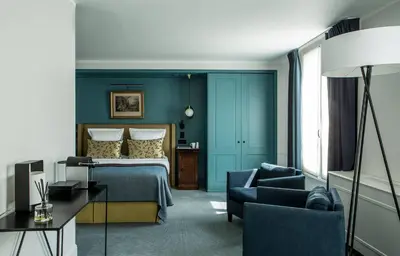 Un ou plusieurs lits dans un hébergement de l'établissement Hôtel Brighton - Esprit de France