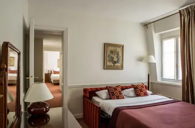 Un ou plusieurs lits dans un hébergement de l'établissement Hôtel Brighton - Esprit de France