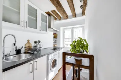 Cuisine ou kitchenette dans l'établissement Saint Germain des Près UNIT 002