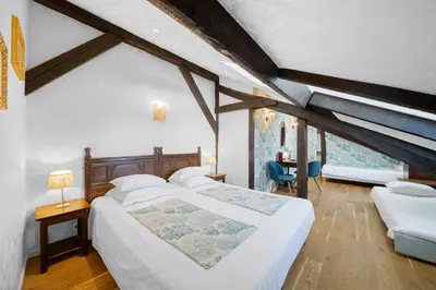 Un ou plusieurs lits dans un hébergement de l'établissement Hotel de la Bretonnerie