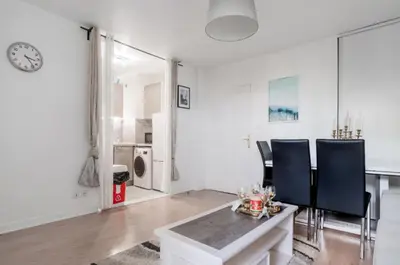 Coin salon dans l'établissement 2P cosy et moderne, Accès Paris et Stade de France