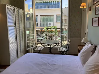 Un ou plusieurs lits dans un hébergement de l'établissement BED and BREAKFAST PARIS QUARTIER CHAMPS-ÉLYSÉES