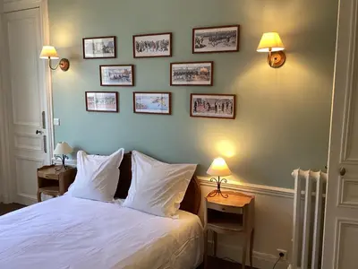 Un ou plusieurs lits dans un hébergement de l'établissement BED and BREAKFAST PARIS QUARTIER CHAMPS-ÉLYSÉES
