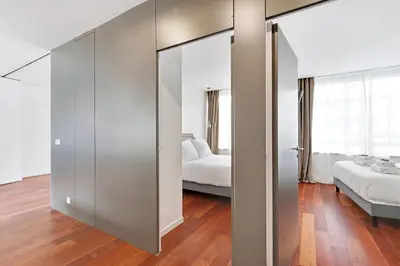 Un ou plusieurs lits dans un hébergement de l'établissement Pick A Flat's Apartment rue Pajol - La Chapelle