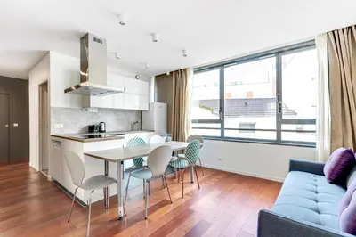 Cuisine ou kitchenette dans l'établissement Pick A Flat's Apartment rue Pajol - La Chapelle