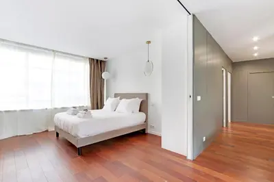 Un ou plusieurs lits dans un hébergement de l'établissement Pick A Flat's Apartment rue Pajol - La Chapelle