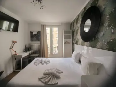 Un ou plusieurs lits dans un hébergement de l'établissement Hotel Le Twelve