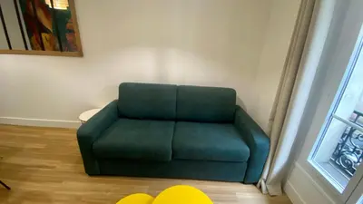 Coin salon dans l'établissement Appartement lumineux proche Saint-Lazare - 8P