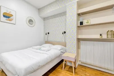 Un ou plusieurs lits dans un hébergement de l'établissement Appartement Familial proche Saint-Lazarre - 6P