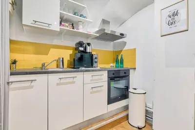 Cuisine ou kitchenette dans l'établissement Appartement Familial proche Saint-Lazarre - 6P