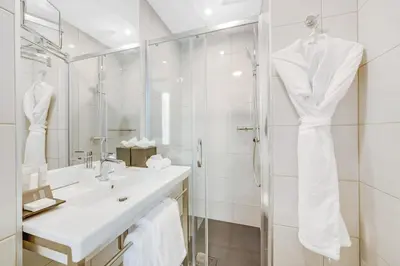 Salle de bains dans l'établissement Hôtel Villa Eiffel Mademoiselle