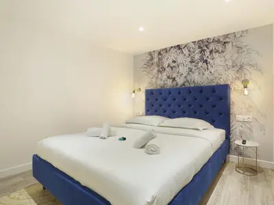 Un ou plusieurs lits dans un hébergement de l'établissement Rent a Room - Apartment St Honore