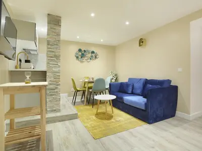 Coin salon dans l'établissement Rent a Room - Apartment St Honore