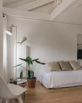 Un ou plusieurs lits dans un hébergement de l'établissement Appartement Vertus