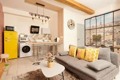 Cuisine ou kitchenette dans l'établissement Appartement Vertus