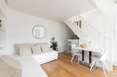 Coin salon dans l'établissement Appartement Vertus
