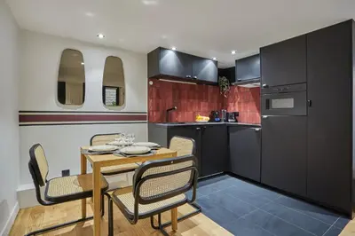 Cuisine ou kitchenette dans l'établissement Apartment St Honore by Studio prestige