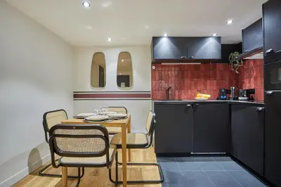 Cuisine ou kitchenette dans l'établissement Apartment St Honore by Studio prestige