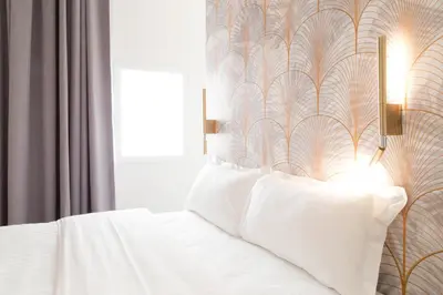 Un ou plusieurs lits dans un hébergement de l'établissement Hôtel So Marais