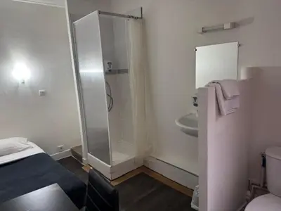 Salle de bains dans l'établissement Hotel Chevallier
