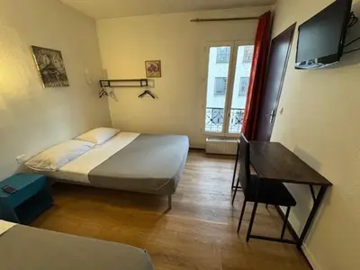 Télévision ou salle de divertissement dans l'établissement Hotel Chevallier