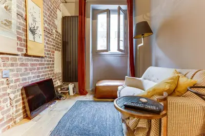 Coin salon dans l'établissement Appartement, Place Vendome