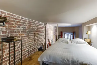 Un ou plusieurs lits dans un hébergement de l'établissement Appartement, Place Vendome