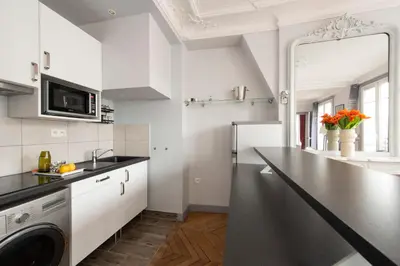 Cuisine ou kitchenette dans l'établissement Objectif Lune
