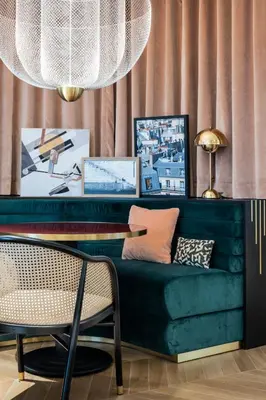 Coin salon dans l'établissement Hôtel Parisianer