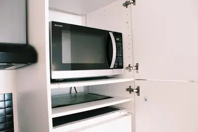 Cuisine ou kitchenette dans l'établissement Lauriston Nice Studio