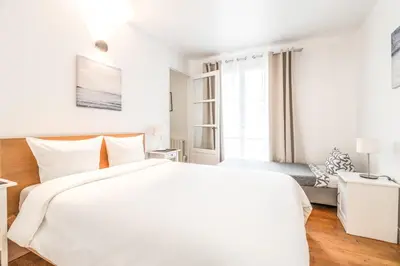 Un ou plusieurs lits dans un hébergement de l'établissement Levis Charming Place