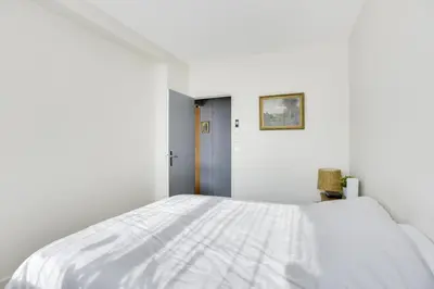 Un ou plusieurs lits dans un hébergement de l'établissement Charming apartment with terrace by Weekome