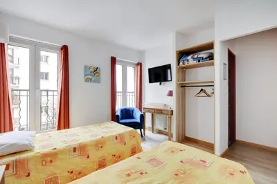 Un ou plusieurs lits dans un hébergement de l'établissement Hotel de l'Europe
