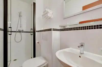 Salle de bains dans l'établissement Hotel de l'Europe