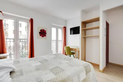 Un ou plusieurs lits dans un hébergement de l'établissement Hotel de l'Europe