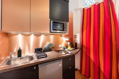 Cuisine ou kitchenette dans l'établissement Studio Bourdonnais