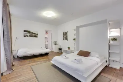 Un ou plusieurs lits dans un hébergement de l'établissement Comfortable flat in the middle of Paris